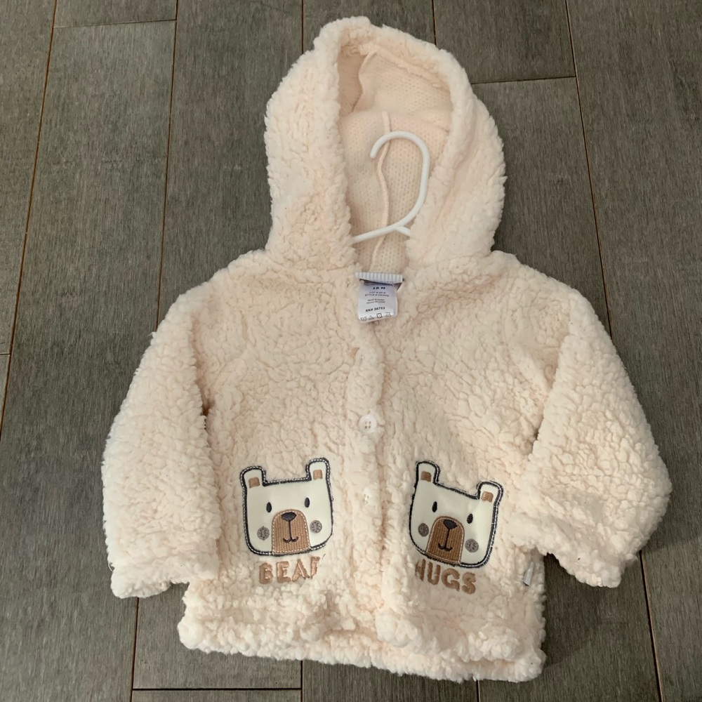 Thin unisex fleece baby jacket.